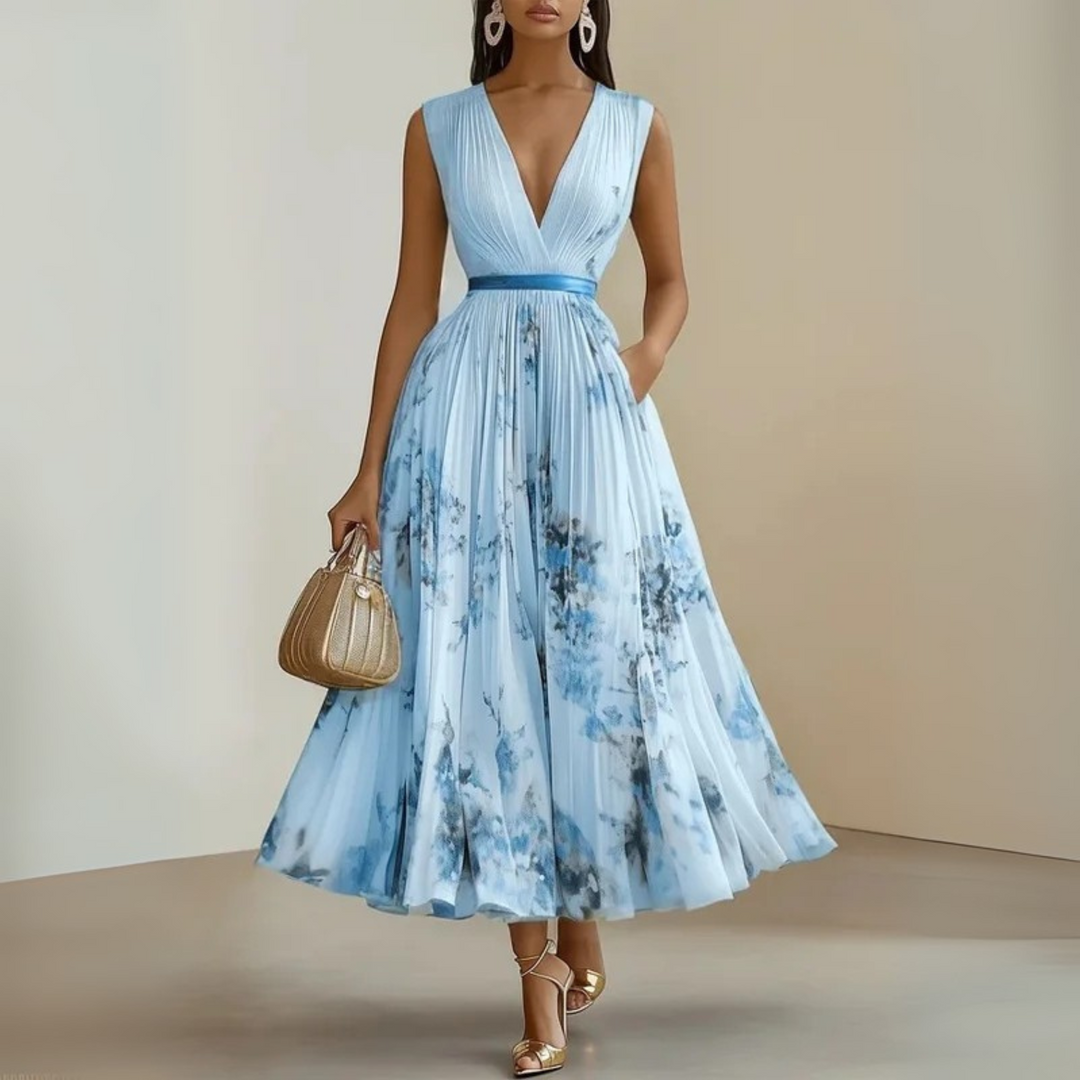 Versatile women's flowing sleeveless maxi dress, ideal for day to night wear, vacation, or spring.