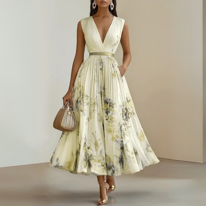 Casual chic women's flowing maxi dress with V-neck, sleeveless design for effortless summer style.
