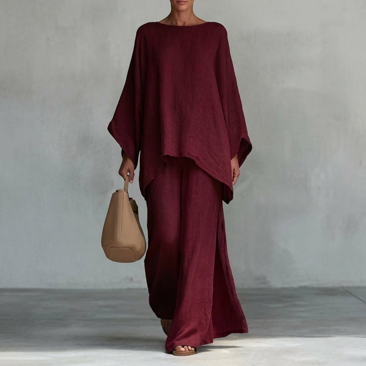 Women's elegant two-piece outfit with an oversized, comfortable tunic top and a flowing, relaxed fit maxi skirt.