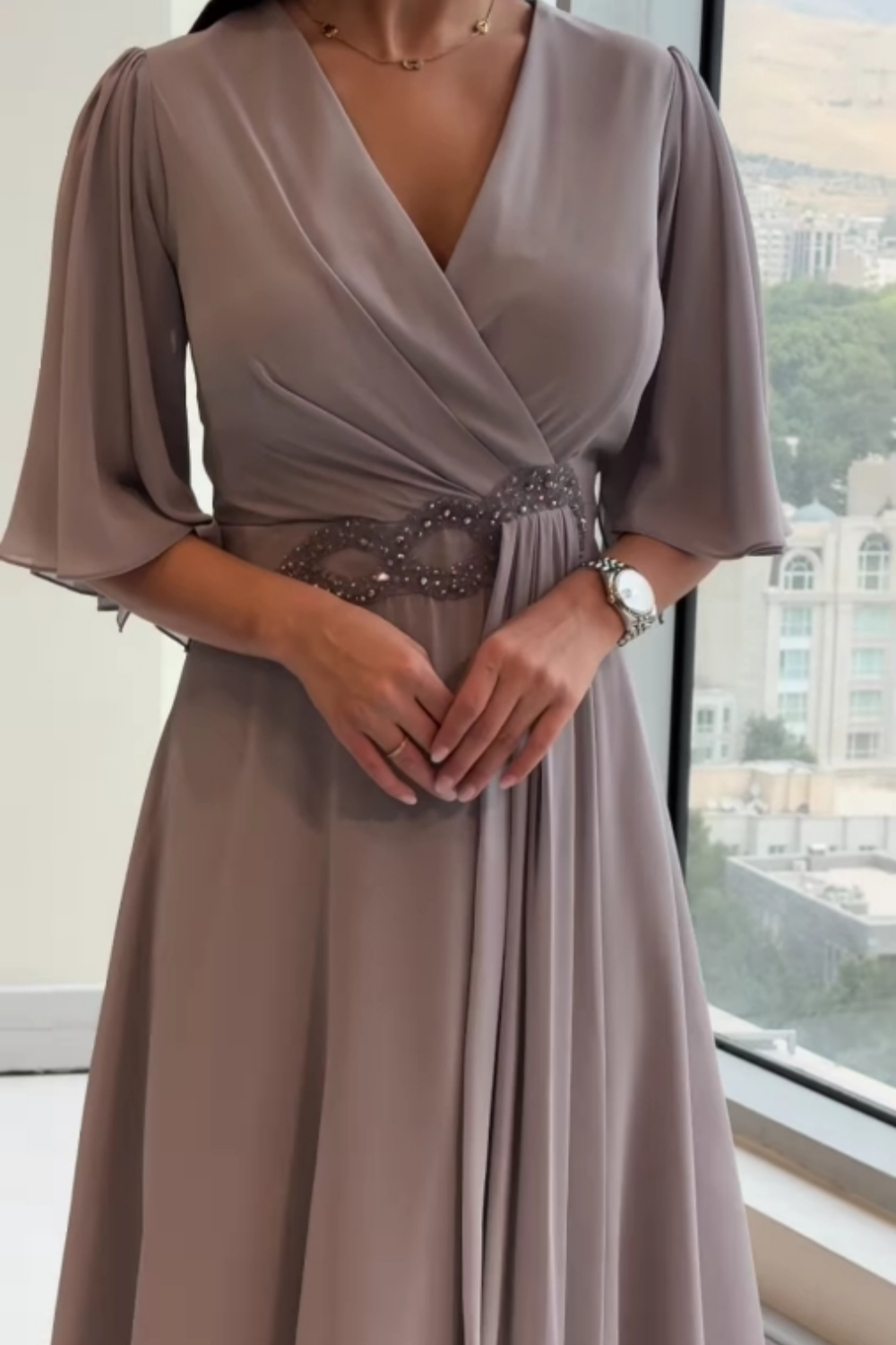 Comfortable women's sleeveless V-neck maxi dress. Flowing design with adjustable straps for summer fashion.