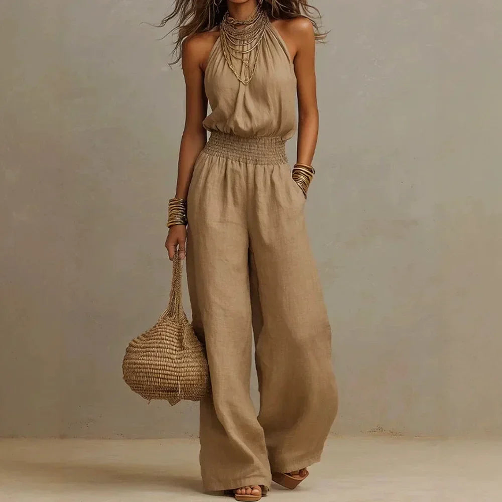 Women's flowing wide leg halter jumpsuit, perfect for summer comfort and relaxed vacation style.