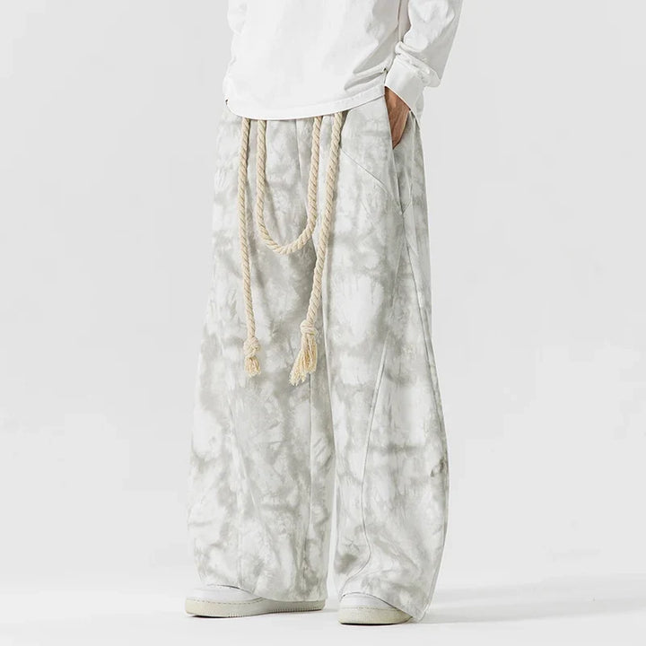 Stylish women's wide-leg pants featuring a unique rope belt, offering a comfortable & flowing silhouette.