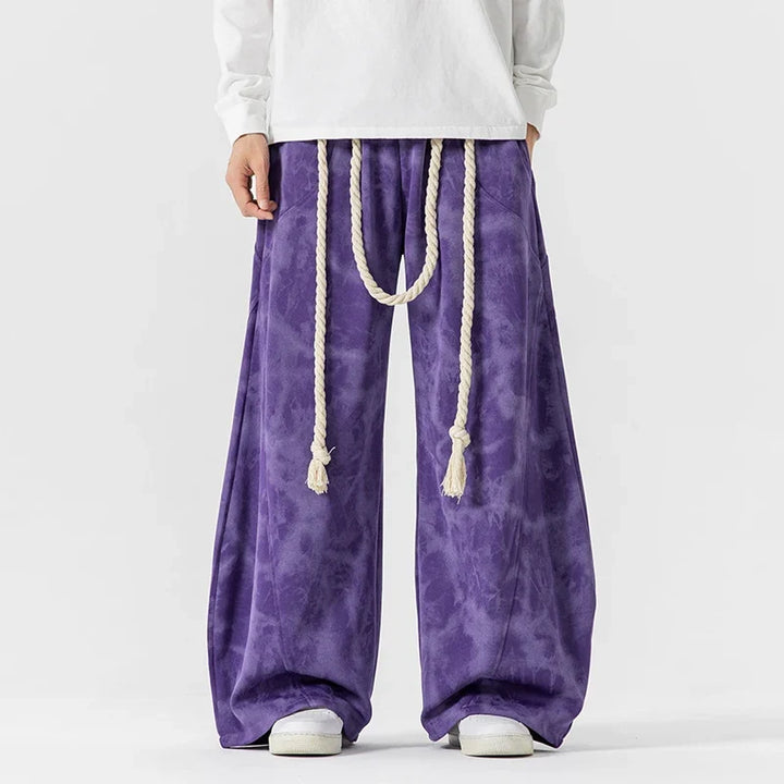 Chic women's pants: flowing wide-leg style & comfortable fabric, complete with an adjustable rope belt.