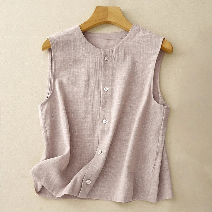Women's flowy asymmetrical blouse in lightweight fabric, perfect for summer. Features stylish sleeveless design.