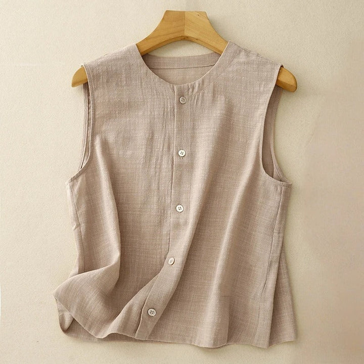Stylish women's sleeveless asymmetrical top with button detail. Lightweight, flowy, and casual chic for everyday wear.