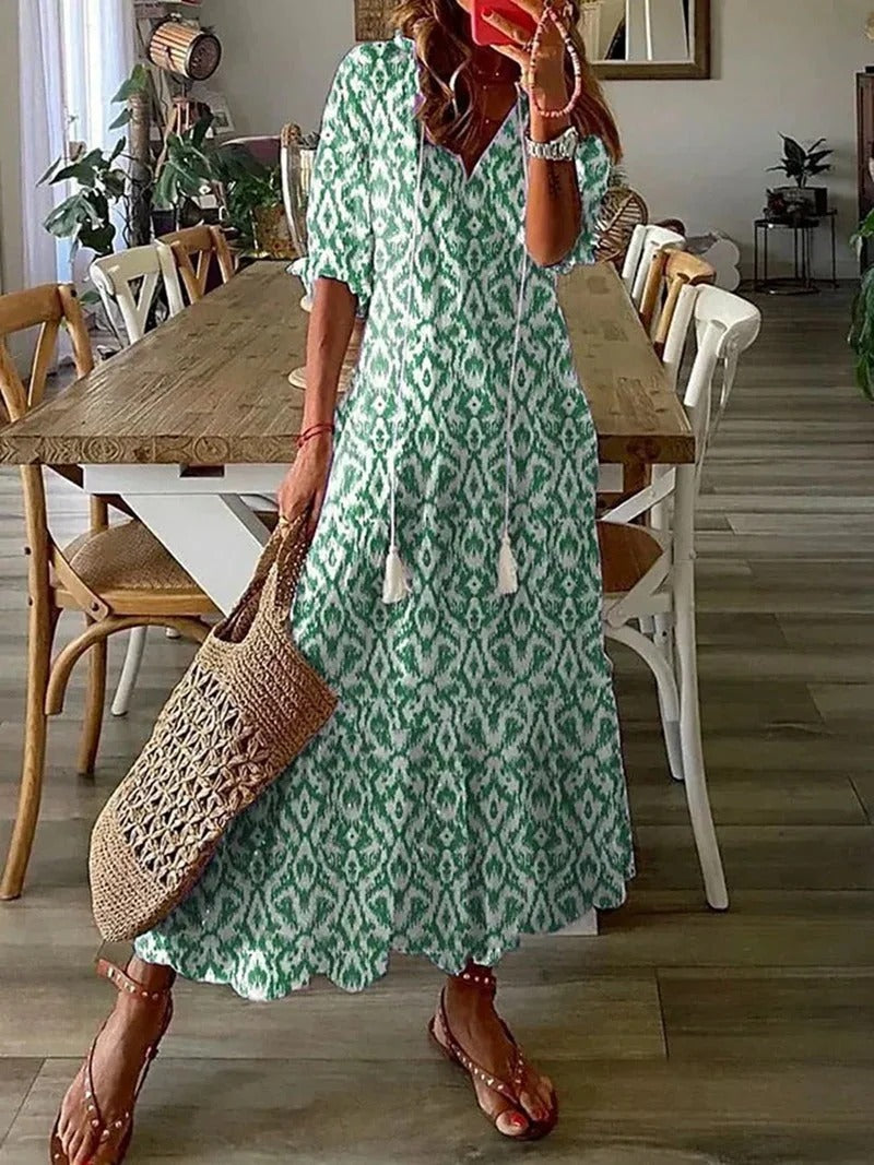 Versatile women's bohemian maxi dress, flowy and patterned, perfect for elegant casual summer wear.
