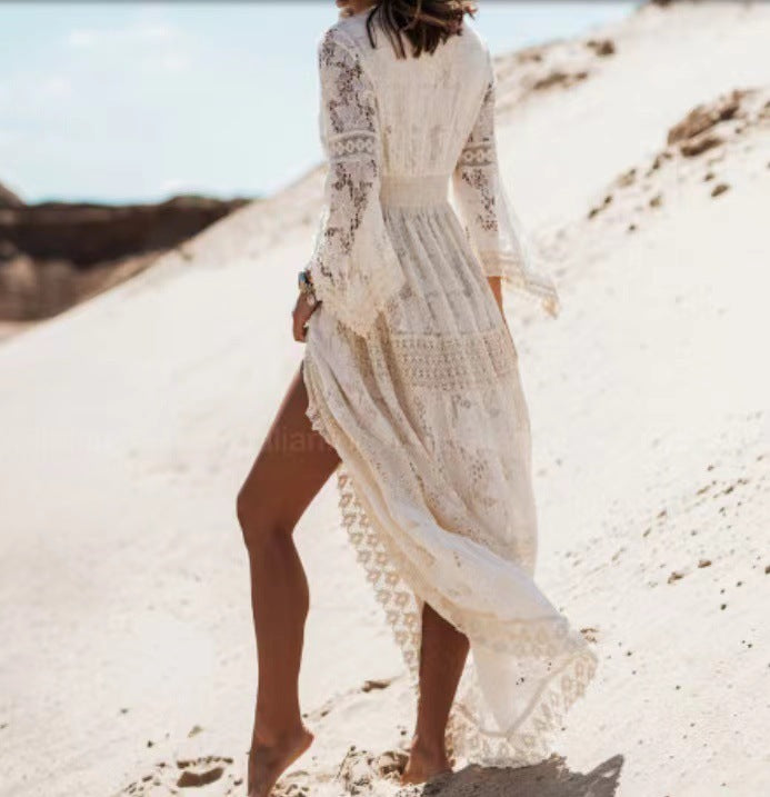 Bohemian maxi dress for women featuring fringe details, a deep V-neck, and a comfortable, flowy design.
