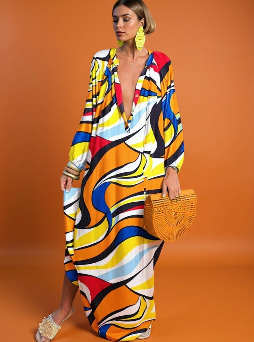 Bohemian style women's flowy print maxi dress. Perfect for beach, summer fashion, casual comfort, vacation.