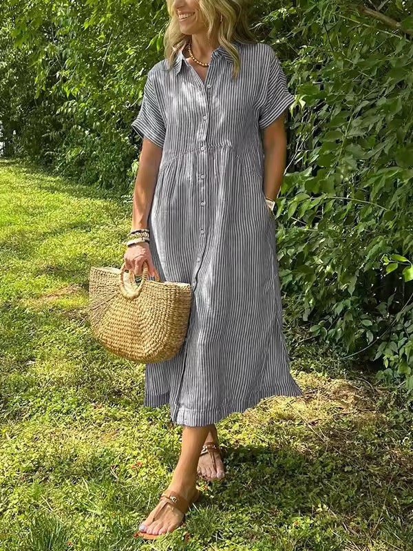Versatile women's long button-through shirt dress, easily styled for various occasions.