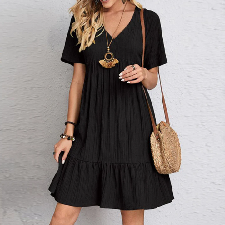 Women's flowy casual summer dress, perfect for warm weather and effortless everyday style.