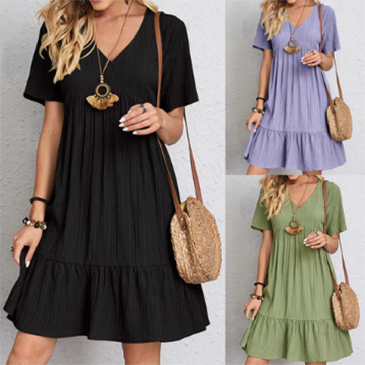 Effortless women's summer sundress, featuring a flowy fit and short sleeves for ultimate comfort.