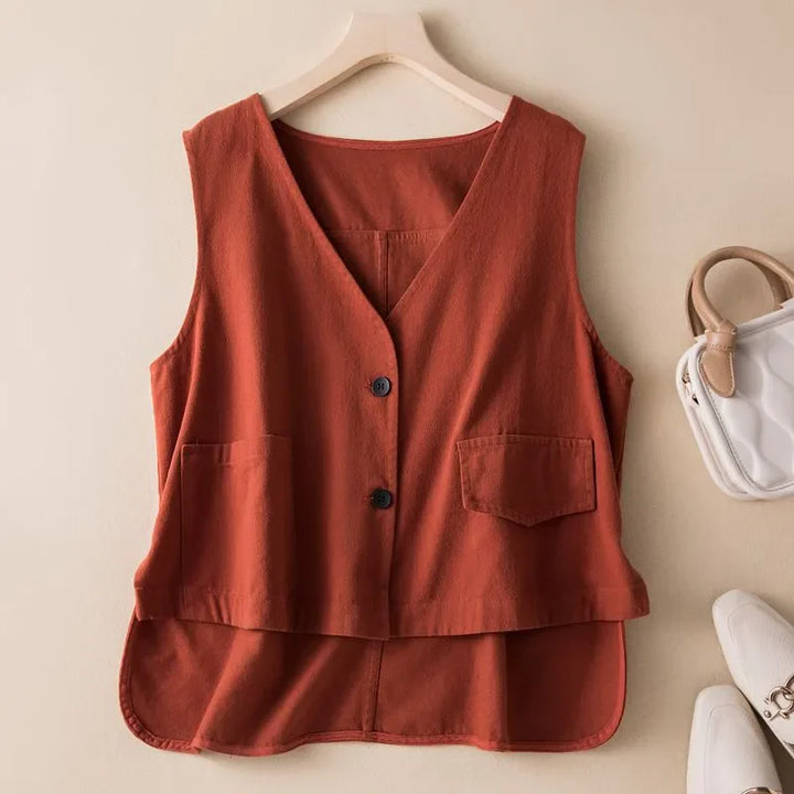Women's flowy cotton blend vest, perfect for layering. Comfortable sleeveless top for versatile wear.