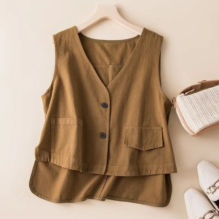 Green women's flowy cotton blend vest. Comfortable sleeveless layering top, versatile for any outfit.