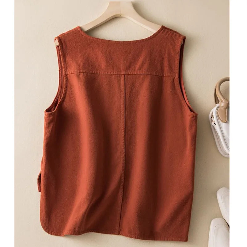 Red women's flowy cotton blend vest. Stylish and comfortable sleeveless top, ideal for layering.
