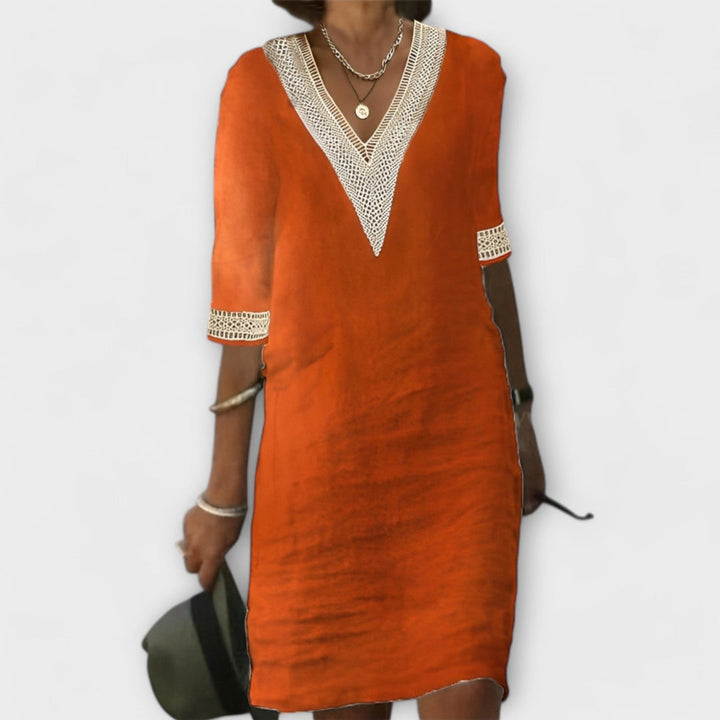 Elegant women's relaxed fit crochet dress, ideal as a casual summer dress or boho-chic beach cover-up.