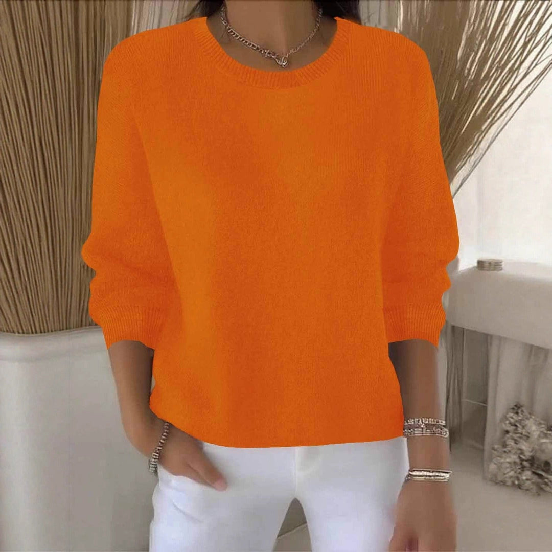 Women's flowy sweater, effortlessly chic for everyday wear, offering comfort and relaxed style.