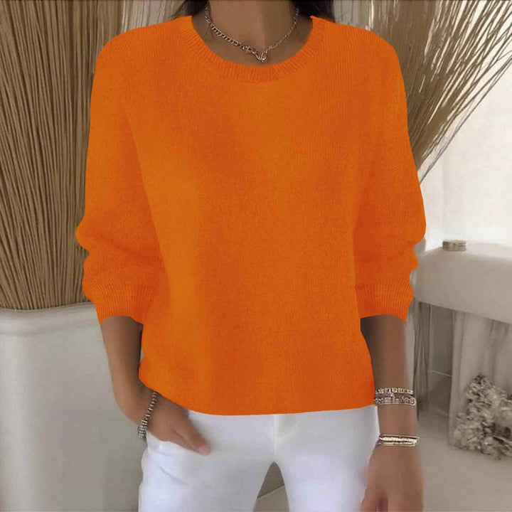 Women's flowy sweater, effortlessly chic for everyday wear, offering comfort and relaxed style.