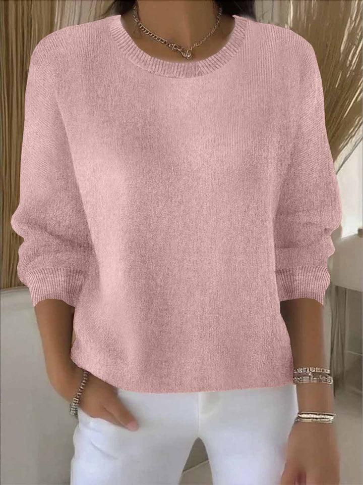 Relaxed fit women's flowy sweater, perfect for casual chic style and ultimate comfort.