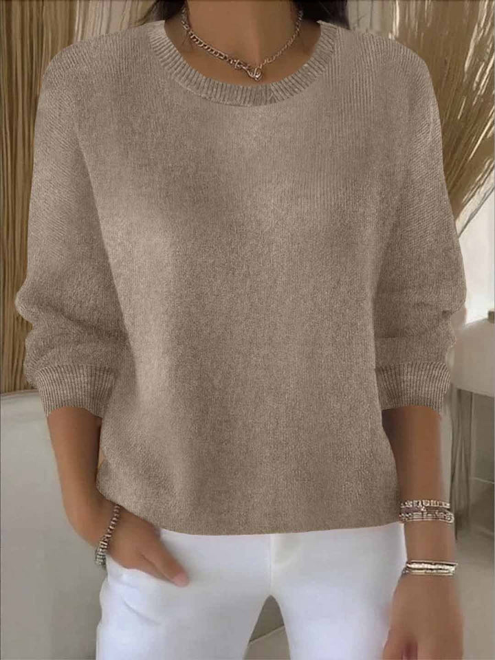 Chic women's flowy sweater, great for casual outings or a comfortable everyday layering piece.