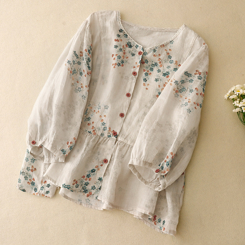 Relaxed fit women's floral long sleeve blouse, a feminine and flowy top ideal for summer fashion.