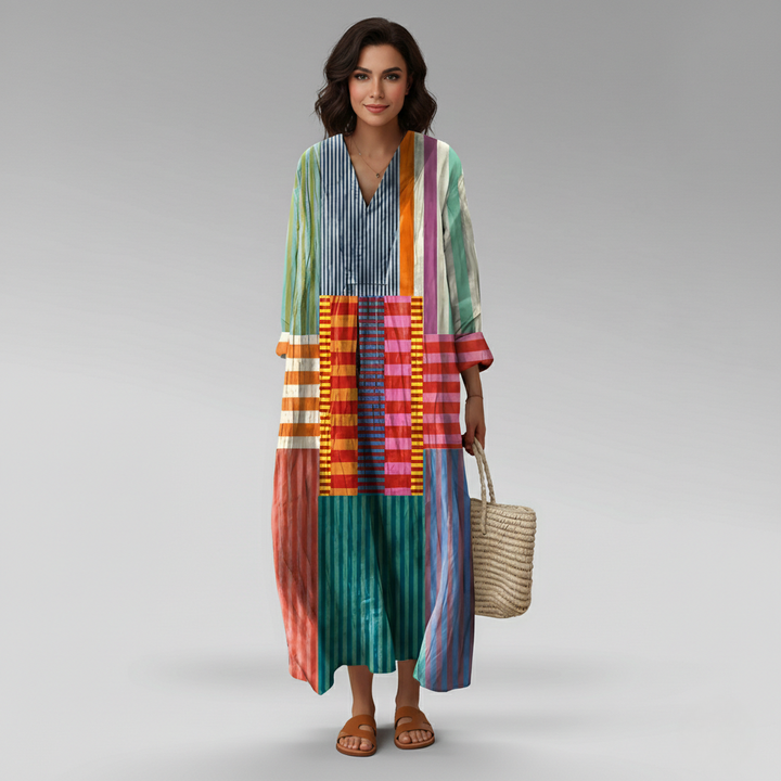 Casual women's flowy geometric print long sleeve maxi dress. Boho V-neck design for comfortable summer, beach, or vacation wear.