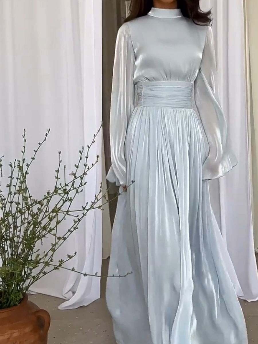 Elegant women's summer maxi dress with a flowing silhouette and a captivating imaginative print for versatile style.