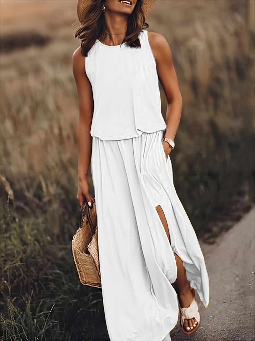 Casual women's sleeveless maxi dress, an elegant flowy design with an elastic waist and pockets.