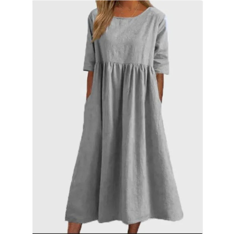 Stylish women's half sleeve maxi dress, featuring a flowy silhouette and practical pockets, ideal for spring.