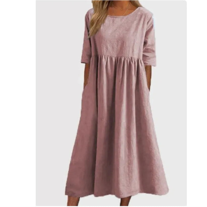 Lightweight women's flowy maxi dress with half sleeves and pockets, a perfect blend of comfort and style for summer.