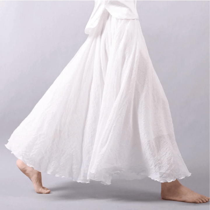 Women's flowy maxi skirt, bohemian A-line style for beach and summer fashion. Perfect for vacation.