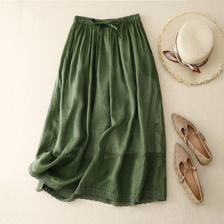 Chic women's flowy maxi skirt with lace trim & adjustable waist for vintage-style casual wear.