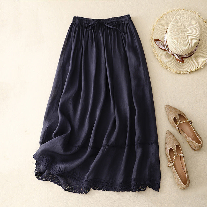 Stylish women's flowy maxi skirt with intricate lace trim. Versatile for casual or elegant summer looks.