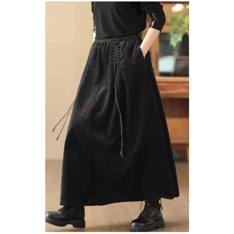 Versatile women's long maxi skirt with corset waist & pockets, great for casual & elegant outfits.