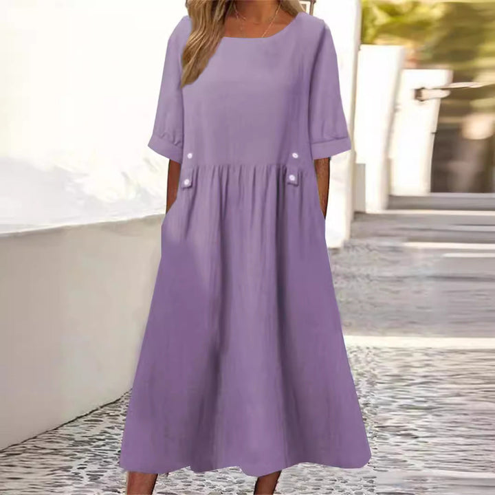 Women's flowy mid-length summer dress, perfect for a comfortable and relaxed everyday style.