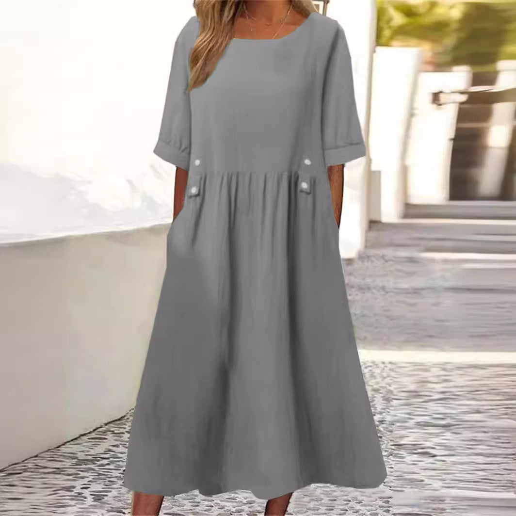 Comfortable women's midi dress with a relaxed fit & round neck. Versatile for casual summer wear.