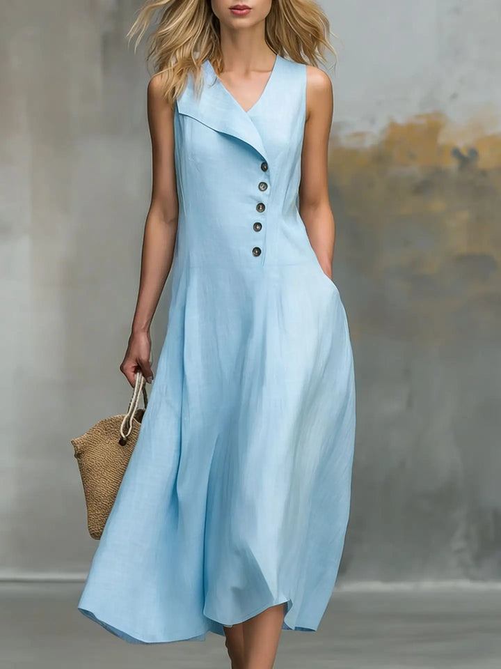 Chic women's sleeveless V-neck midi dress featuring stylish button details and a relaxed, flowy silhouette.