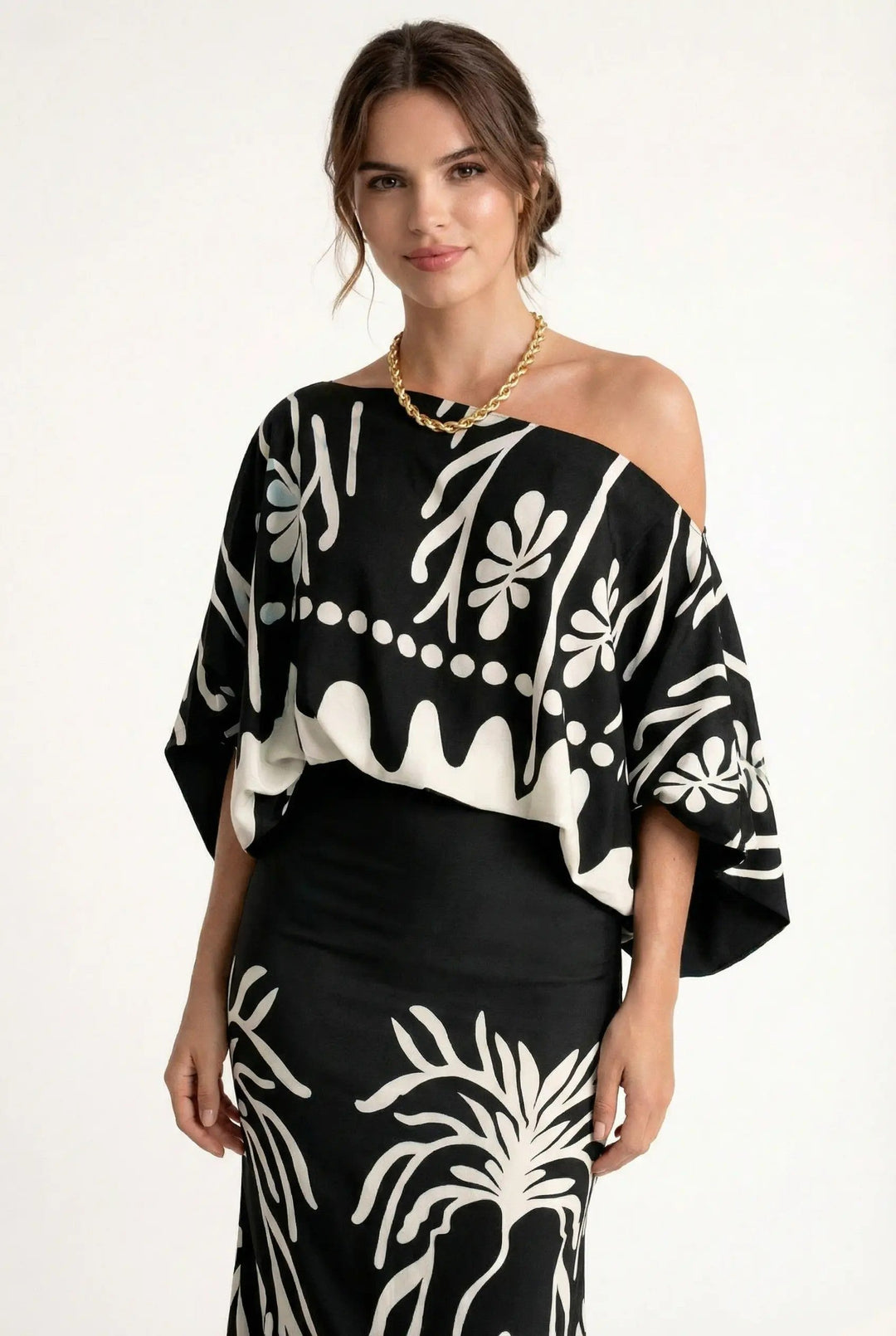 Trendy women's printed co-ord set featuring a stylish blouse and a long, flowy maxi skirt for summer fashion.