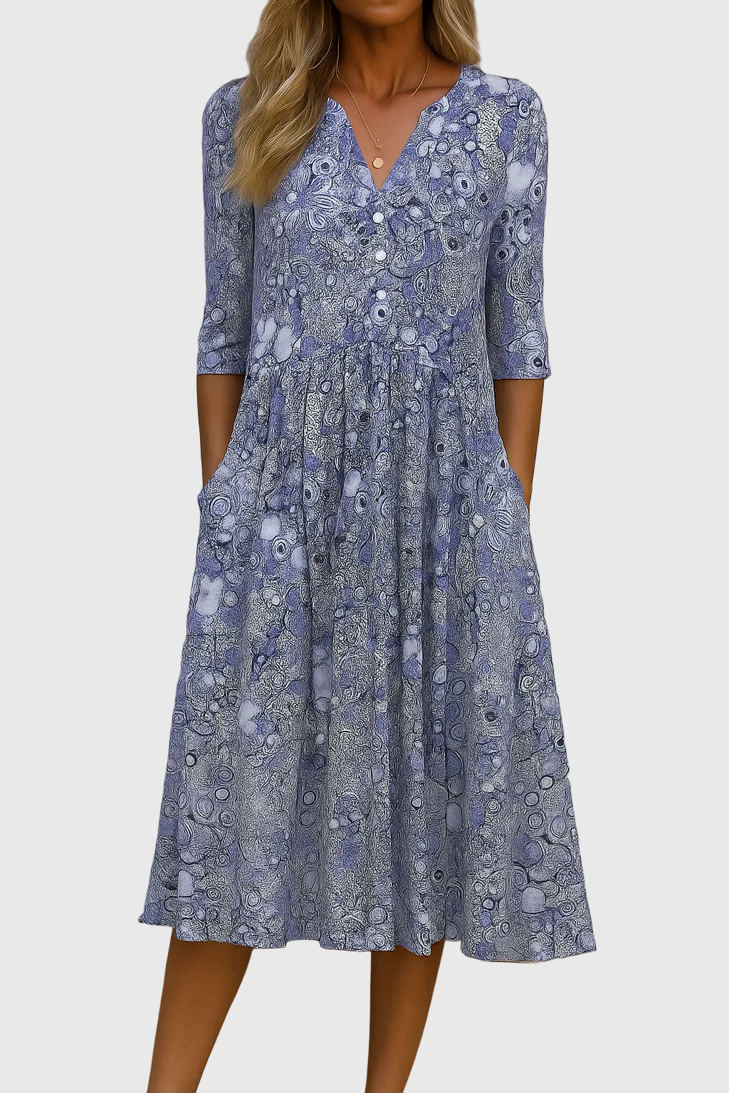 Comfortable women's printed midi dress, versatile V-neck style with three-quarter sleeves for everyday elegance.