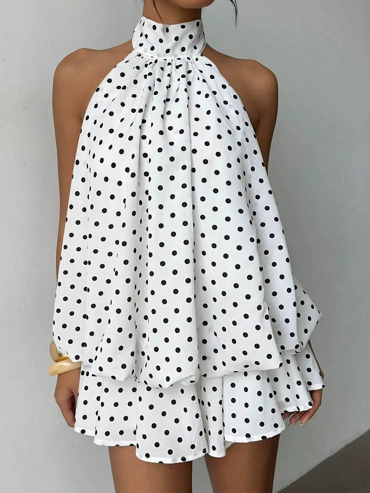 Versatile women's mini dress: a flowy halter style with ruffles & open back, great for day or night.