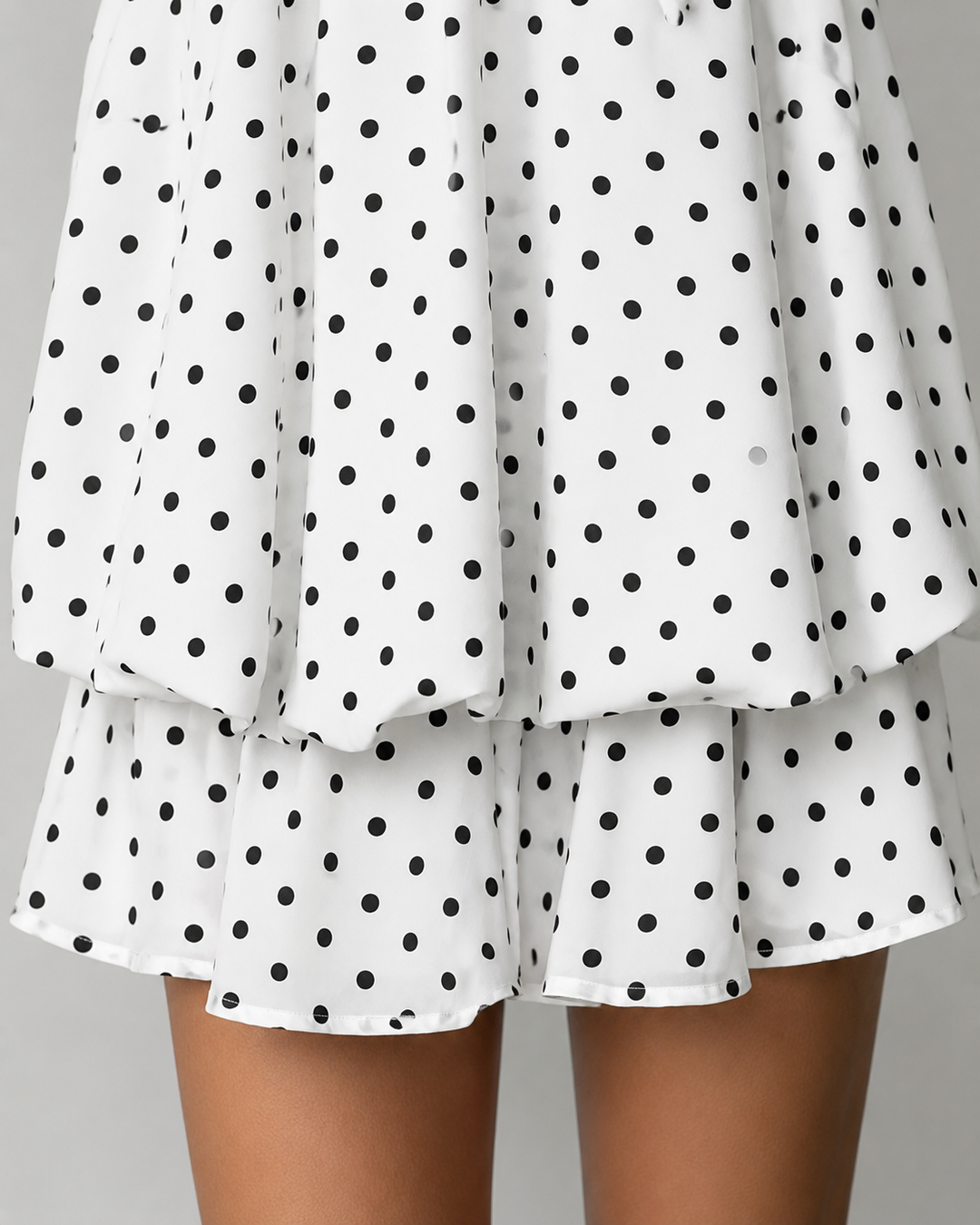 Elegant women's party mini dress with a flattering halter neck, ruffle hem & open back design.