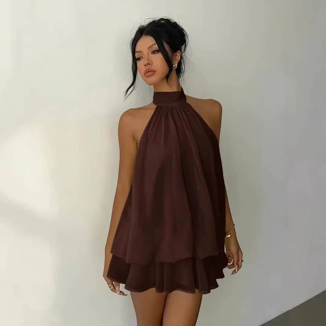 Front view of a women's chic halter mini dress, flowy with a ruffle hem, perfect for casual wear.