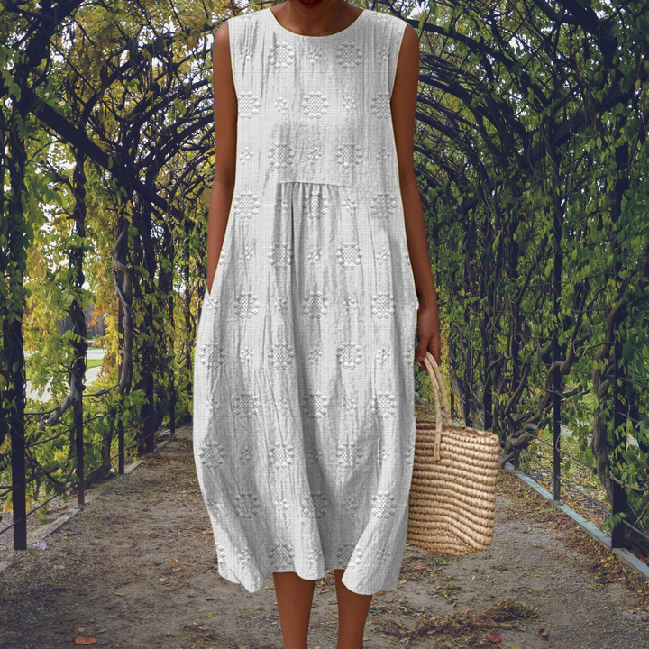 Sleeveless midi dress for women. Flowy summer style, perfect for casual outings or elegant vacation wear.