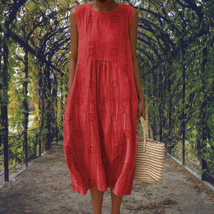 Stylish women's flowy sleeveless midi dress. Effortless summer fashion for comfort and versatility.