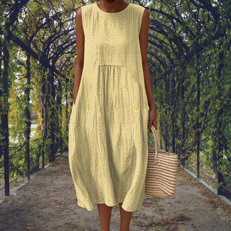 Women's sleeveless flowy midi dress. Comfortable & elegant summer style, ideal for casual or vacation.