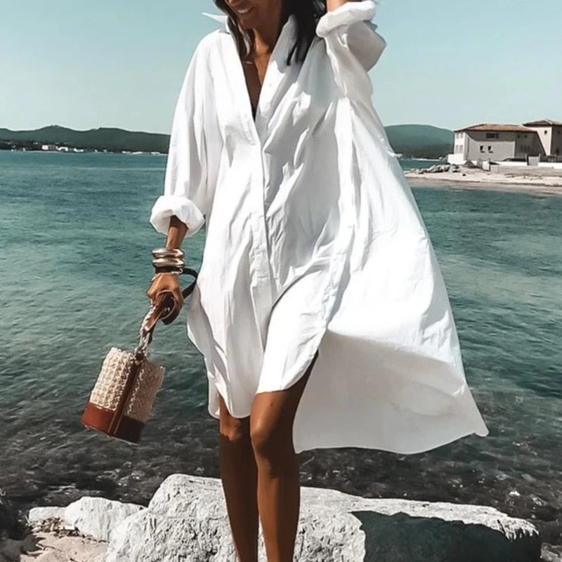 Women's flowy summer dress with a chic print, ideal for casual wear, holidays & versatile day-to-night style.