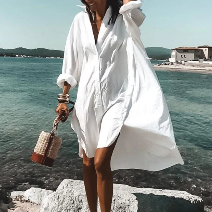 Women's flowy summer dress with a chic print, ideal for casual wear, holidays & versatile day-to-night style.