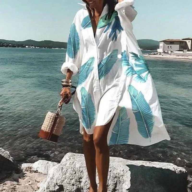 Comfortable & chic women's flowy summer dress. Versatile printed design for casual wear or holiday style.