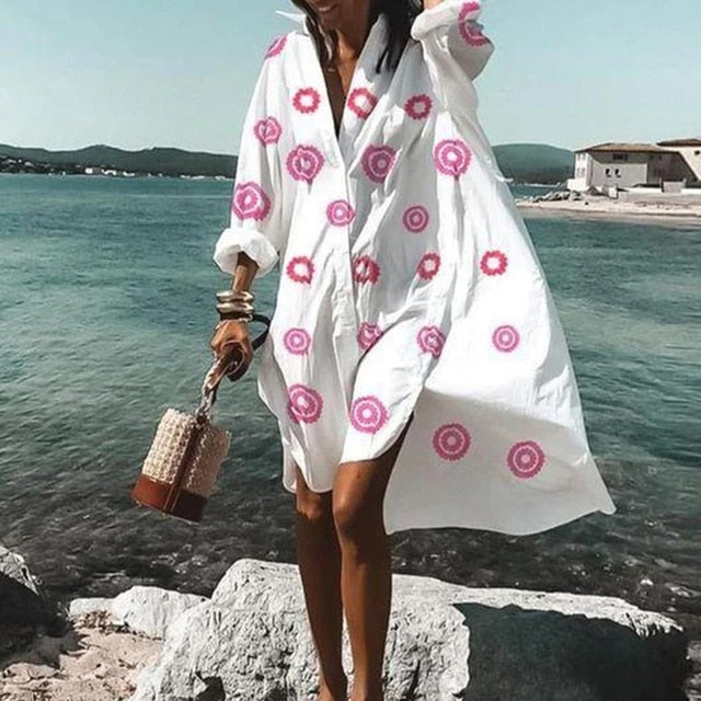 Lightweight women's flowy summer dress with a beautiful print. Ideal for casual, holiday, and day-to-night wear.