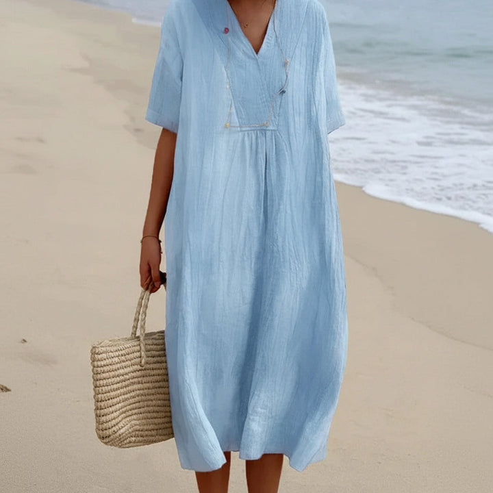 Women's flowy summer midi dress in an A-line cut, designed for effortless casual style & comfort.