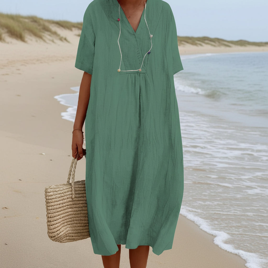 Comfortable women's flowy beach dress with pockets, ideal for summer holidays, vacation, and resort wear.